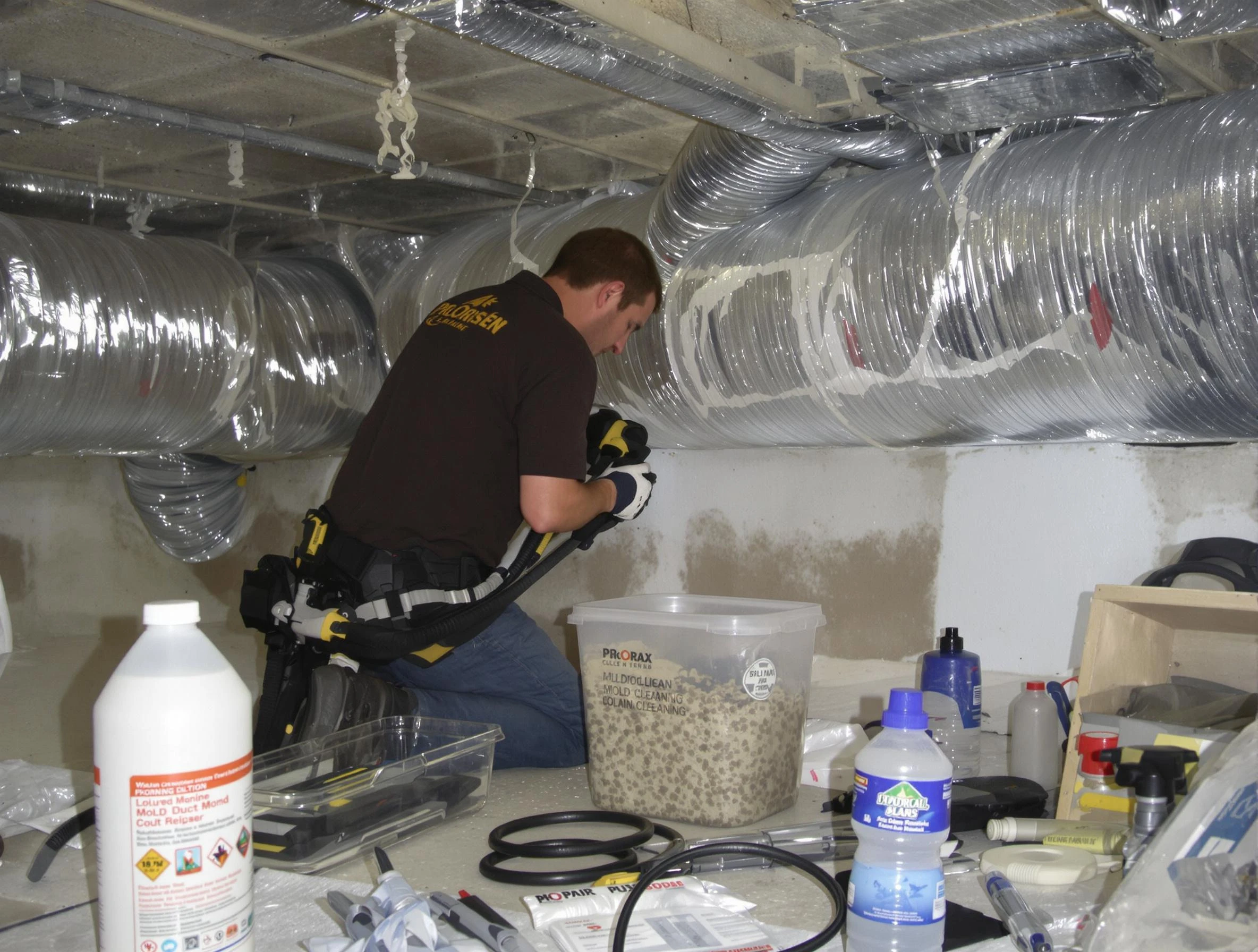 Woonsocket Air Duct Cleaning specialist performing professional mold removal from air ducts in Woonsocket